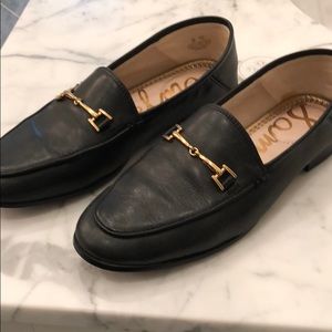 Black leather loafers